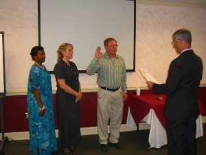 New officers for Augusta-Fort Gordon are sworn in during the August meeting. Joe Yavorsky (r), incoming chapter president, swears in Angela Owens-Campbell (l), incoming secretary; Deborah Huffman (2nd from l), incoming treasurer; and John Overton, incoming vice president.